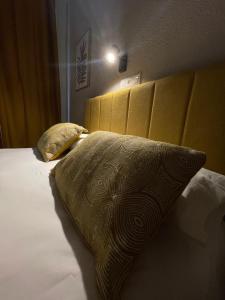 Postel nebo postele na pokoji v ubytování Sueños de Lorca Guest House