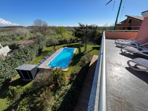 an image of a swimming pool on a balcony at Casa Cino in Umag