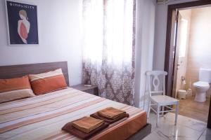 Tempat tidur dalam kamar di Cova da Iria 2 bedroom apartment