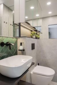 Koupelna v ubytování AVAPARTS apartament GREEEN