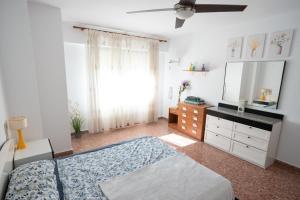 Posteľ alebo postele v izbe v ubytovaní An apartment in Xeraco with 3 bedrooms, located near beach and Gandia