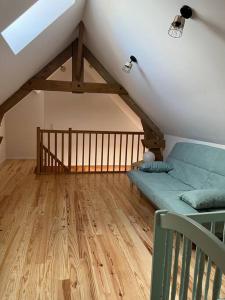 Ένα ή περισσότερα κρεβάτια σε δωμάτιο στο La Petite Maison