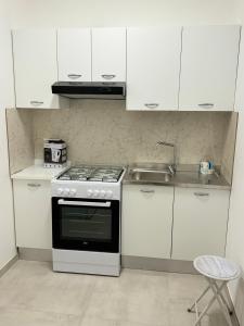 Cuina o zona de cuina de B&B-Guest house 'IN PIAZZETTA'