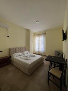 Letto o letti in una camera di Hotel Antik