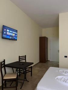 Letto o letti in una camera di Hotel Antik