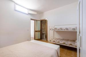 Postel nebo postele na pokoji v ubytování Casa vacanze Tafuro