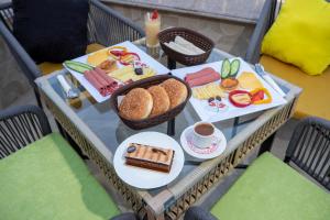 a table with food on top of a table at City View Palace hotel in Cairo