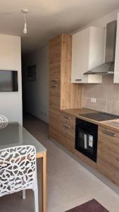 Kuchyň nebo kuchyňský kout v ubytování Marsaxlokk 3 Bedroom Penthouse + 5 fotografií