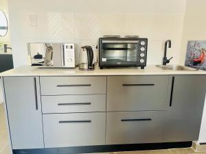 Kuchyň nebo kuchyňský kout v ubytování Room in BB - TrendyBliss Guest House - Room 4