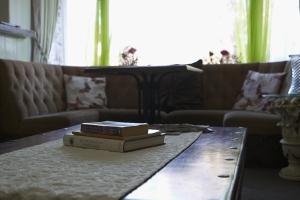 two books on a coffee table in a living room at The Eastleigh in Skegness