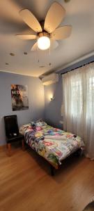 Łóżko lub łóżka w pokoju w obiekcie Semi-detached Adosado con Encanto -130 m2 - WiFi 600 Mb - Piscina Comunitaria - Patio Privado
