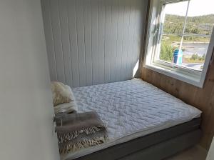 Postel nebo postele na pokoji v ubytování Utleieleilighet 4 sengeplasser Ski inn og ut