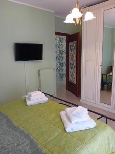 Postel nebo postele na pokoji v ubytování acasadimamma