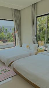 Ein Bett oder Betten in einem Zimmer der Unterkunft Jeju Homestay