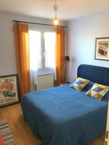 En eller flere senge i et værelse på La Maison d'en face