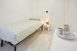Postel nebo postele na pokoji v ubytování Modern flat per 6 Aviano AC Parking + 31 fotografií