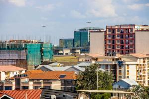 a group of buildings in a city with roofs at AirBnB in Nairobi