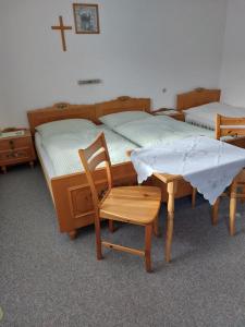 מיטה או מיטות בחדר ב-Chalet Schwaiberg