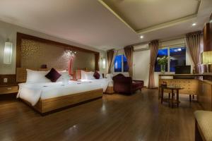 Voodi või voodid majutusasutuse Eliana Ruby Hotel & Travel toas