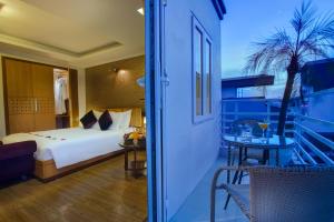 Voodi või voodid majutusasutuse Eliana Ruby Hotel & Travel toas
