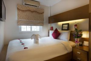 Voodi või voodid majutusasutuse Eliana Ruby Hotel & Travel toas