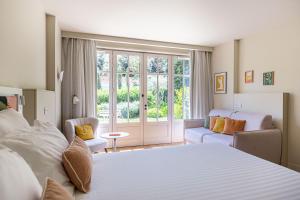 La Villa du Moulleau客房内的一张或多张床位