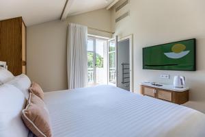La Villa du Moulleau客房内的一张或多张床位