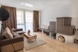 Posezení v ubytování Deluxe Apartement Tirol