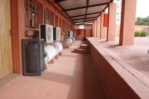 an empty hallway of a building with pipes at Rheotessa Deben in Dagbreek
