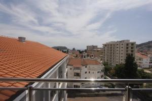 a view of a city from a balcony at Apartman Mimoza in Budva