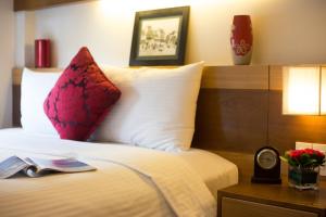 Voodi või voodid majutusasutuse Eliana Ruby Hotel & Travel toas