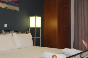 Posteľ alebo postele v izbe v ubytovaní Village Drapanias Apartments