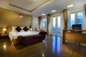 Voodi või voodid majutusasutuse Eliana Ruby Hotel & Travel toas