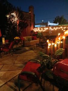 a patio with a lot of lights on a building at Delightful Empowerment Palace in Philadelphia