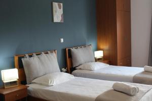 Posteľ alebo postele v izbe v ubytovaní Village Drapanias Apartments