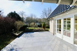 Κήπος έξω από το Vrijstaande villa met grote tuin, 4 slaapkamers en sauna +30 φωτογραφίες