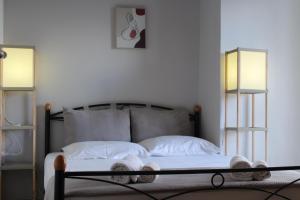 Posteľ alebo postele v izbe v ubytovaní Village Drapanias Apartments