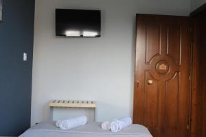 Posteľ alebo postele v izbe v ubytovaní Village Drapanias Apartments