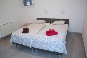 Ein Bett oder Betten in einem Zimmer der Unterkunft Villa LAVA