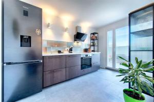 Kuchyň nebo kuchyňský kout v ubytování Apartment Marija