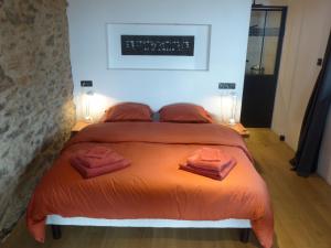 En eller flere senge i et værelse på Louradou-sur-Ciel