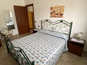 Postel nebo postele na pokoji v ubytování VILLA LUCIA