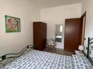 Postel nebo postele na pokoji v ubytování VILLA LUCIA