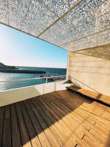 a view of the ocean from a deck of a boat at Cabanon Le Perchoir des Goudes in Marseille