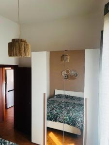 Postel nebo postele na pokoji v ubytování Santa Sofia house + 12 fotografií