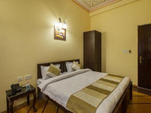 Postel nebo postele na pokoji v ubytování Hotel Amer View