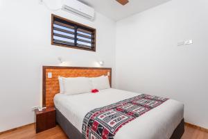 Voodi või voodid majutusasutuse Atupa Suites toas