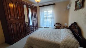 En eller flere senger på et rom på Casa Aranci