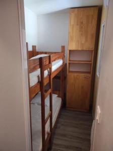 Postel nebo postele na pokoji v ubytování Studio Pied télécabine Pas de l'Ours 4 Personnes