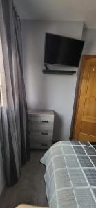 A bed or beds in a room at Xeraco Beach Alma